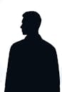 Startseite Silhouette of a man in profile view against a bright white background, creating a moody atmosphere.